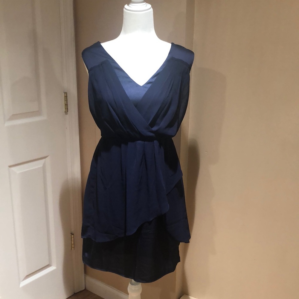 Beautiful funky special occasion dress . Purchased at a local boutique.